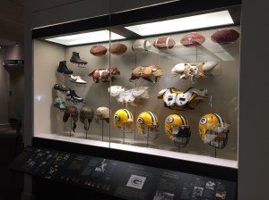 Display of changes in athletic equipment at the Green Bay Packers Hall of Fame.